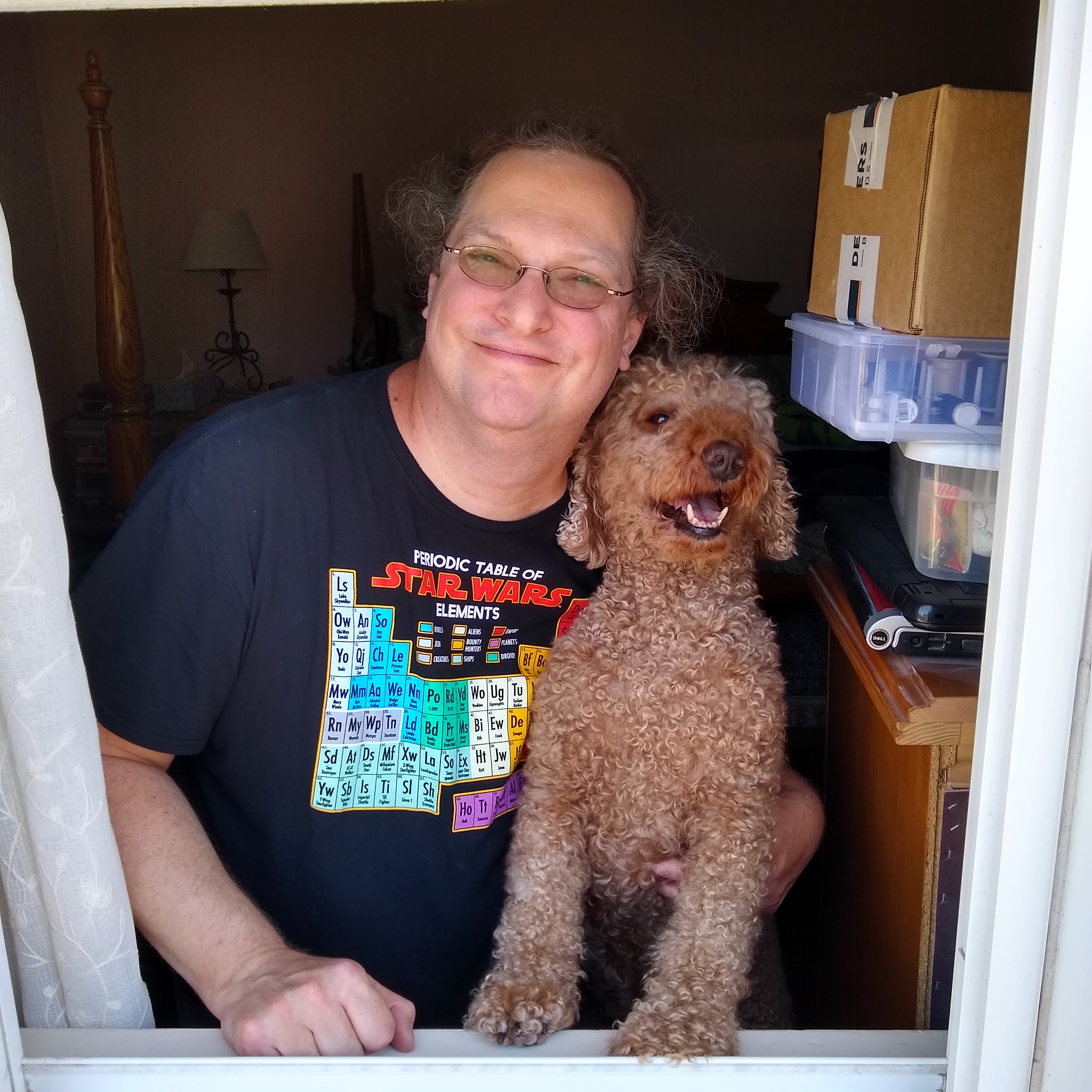 Dog lookig out window with Dad